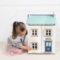 H125-blue-belle-girl-closing-shutter-on-front-of-the-house.jpg