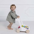 PL102-toddler-learning-to-walk-with-walker.jpg
